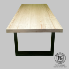 Front view of Mod-G dining table featuring a solid spruce top and rectangular Rustrite steel legs