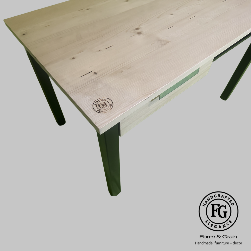 StudioMesh Desk with solid spruce top, steel legs and mesh storage shelf by Form & Grain.