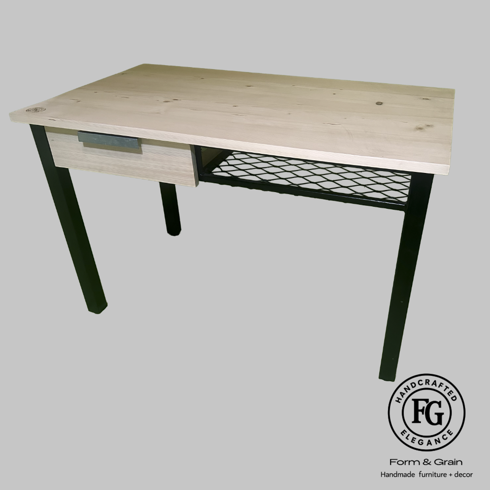 StudioMesh Desk with solid spruce top, steel legs and mesh storage shelf by Form & Grain.